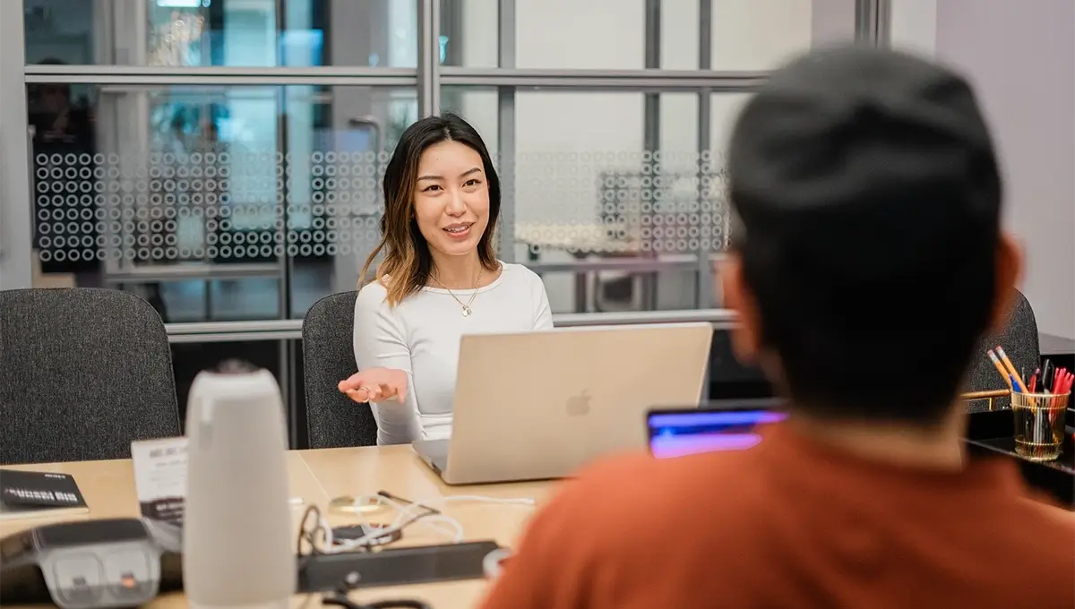 Clear Digital team working together on AI work