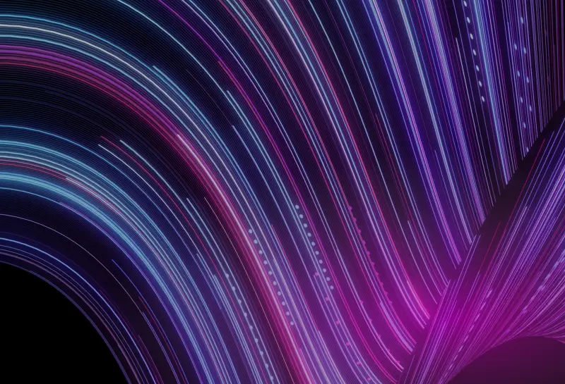 Abstract digital wave background with flowing lines in blue, magenta, and purple tones on a black backdrop