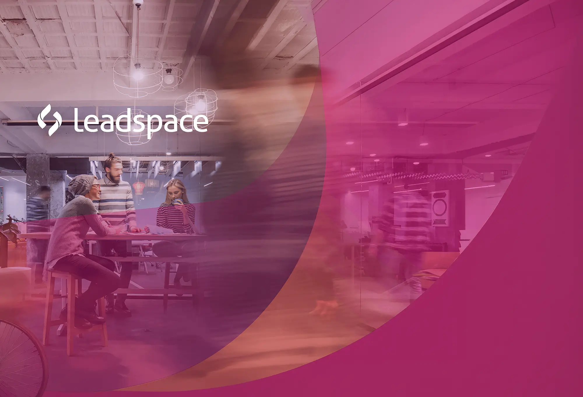Leadspace branding displayed in a modern office workspace with team collaboration and motion blur effects.